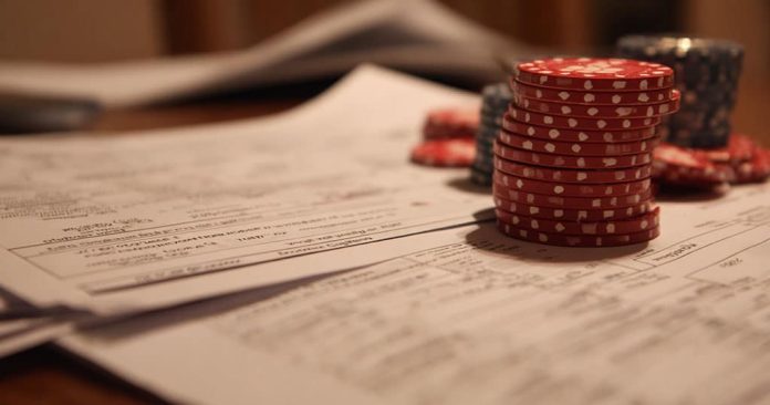 lot-poker-chips-table-papers-001
